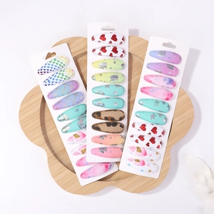 Detailed set of 30 fabric BB hair clips with glitter unicorns and rainbow patterns