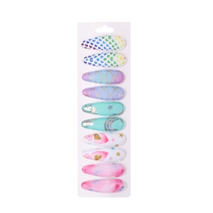 Detailed set of 10 children's fabric snap clips with rainbow and unicorn patterns