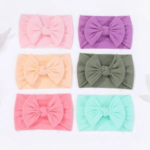 Set di 6 fasce elastiche in nylon per neonati con grandi fiocchi in vari colori