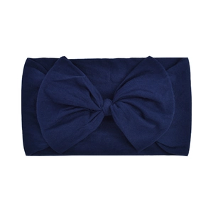 Navy blue elastic nylon headband with a large bow for infants and toddlers