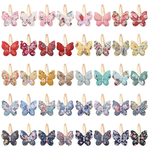 40-piece butterfly hair clip set for girls with floral prints and pearl accents