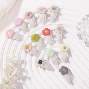 Detail of 12-piece set of embroidered 3D flower mini hair clips with teardrop BB clips