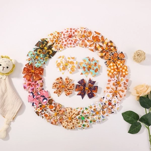 Set of 20-30 pieces autumn and Thanksgiving themed hair bows for girls with festive patterns
