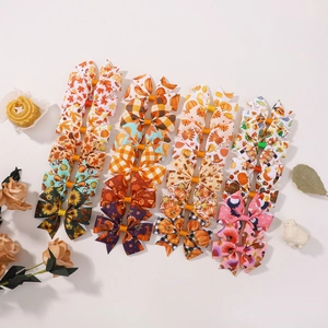 Thanksgiving hair bows set with turkey and pumpkin prints for autumn kids hair styling