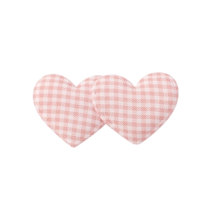 Close-up of pink checkered fabric heart hair clips with soft padded texture for kids