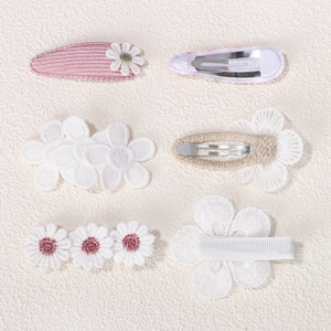 Close-up of 6-piece cute floral hair clips with lace embroidery and daisy patterns