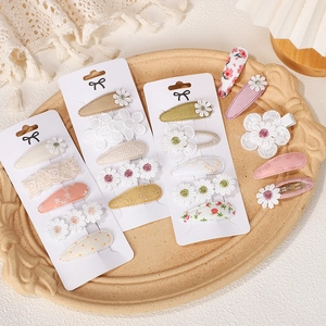 Cute embroidered floral baby hair clips set with lace and daisy fabric patterns