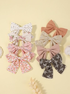 Set di 8 fermagli per capelli a fiocco in cotone e lino con stampe floreali e ricami
