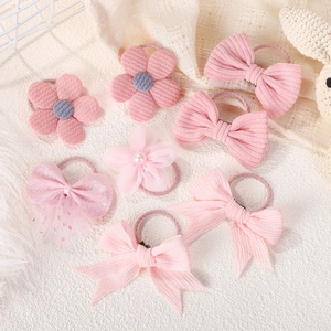 Set de 7 chouchous roses pour filles avec nœuds en velours côtelé et fleurs en mousseline