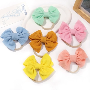 6-pack of cute waffle fabric baby headbands with colorful bows on high-elastic nylon bands
