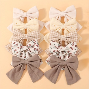 Set di 10 fermagli per capelli con fiocchi in rosa, beige e marrone a motivi floreali