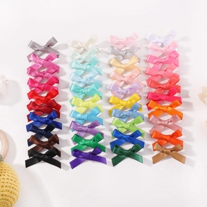 Set of 40 colorful ribbon bow hair clips for girls in various gradient shades