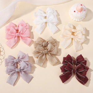 Double-layered fabric hair clips with silver edges in six soft colors for girls