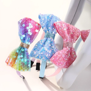 Three gradient glitter bow headbands for girls in rainbow, light blue and pink colors