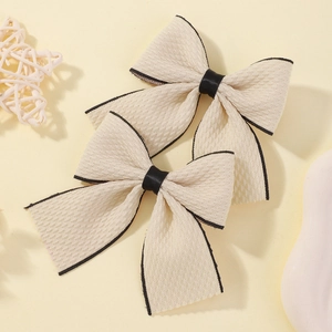 Set of two beige fabric bow hair clips with black trim edge for girls Lolita style