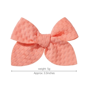 Handmade 3.3-inch jacquard fabric hair bow clip in coral pink for children