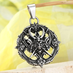 Detailed macro view of vintage stainless steel Japanese samurai mask and katana pendant