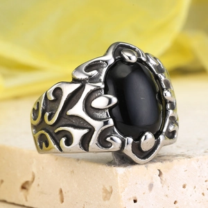 Vintage gothic flower ring in titanium steel with a large oval black stone center
