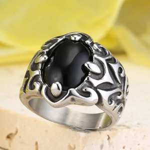 Retro punk men's stainless steel ring featuring a black oval stone and gothic floral patterns