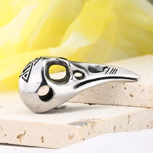 Detailed view of vintage viking raven skull ring showing geometric engravings and polished finish