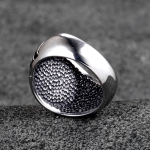 Vintage cross steel ring for men with polished surface and honeycomb texture inside