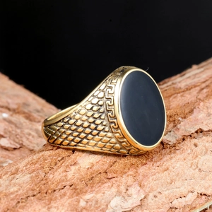 Vintage men's titanium steel gold ring with oval black onyx stone on tree bark