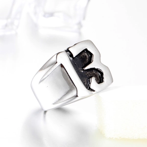 Punk style silver stainless steel ring featuring a bold number 13 engraved design