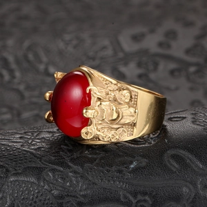 Vintage gold-plated titanium steel ring with red gemstone and Chinese relief carving