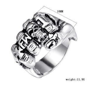 Detail view of punk skull ring showing 18mm width and 11.9g weight in silver steel