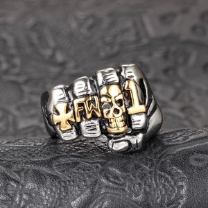Gothic punk skull fist ring in vintage titanium steel with golden cross and letters