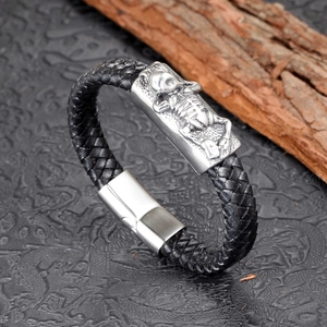 Bracelet en cuir tressé noir avec plaque crâne en acier inoxydable et fermoir magnétique