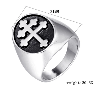 Macro detail of men's stainless steel signet ring with black cross inlay, size 21mm