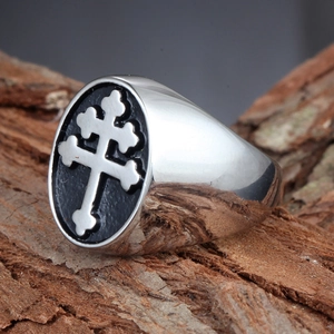 Vintage gothic men's stainless steel signet ring with silver double cross on black background