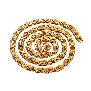 Close-up of golden Byzantine weave stainless steel chain necklace with lobster clasp