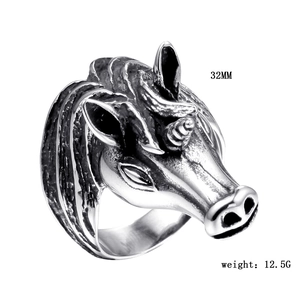 Macro detail of vintage punk unicorn ring showing intricate textures and 32mm size scale