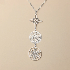 Silver stainless steel triple layered necklace featuring witch knot and pentagram charms
