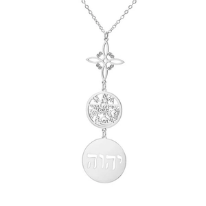 Macro detail of silver stainless steel witch knot and pentagram pendant necklace