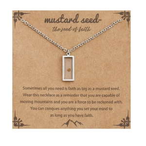 Silver mustard seed necklace with transparent pendant on faith inspired card