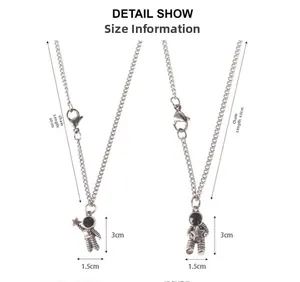 Detail view of astronaut pendants with dimensions 3cm height and 60cm chain length