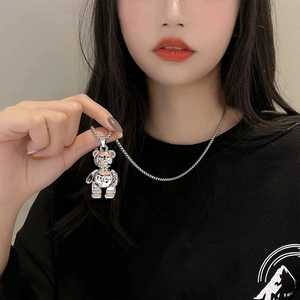 Polished silver mechanical bear pendant necklace on a stainless steel chain for women