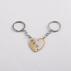 Couples stainless steel keychain with heart shaped interlocking cats in gold and silver