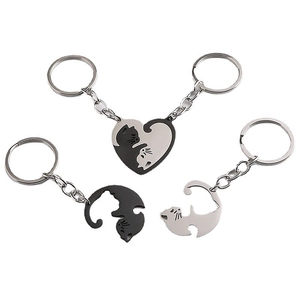 Couples heart jigsaw cat keychains in black and silver stainless steel set