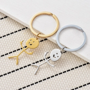 Funny stickman keychains in gold and silver stainless steel with humorous gesture