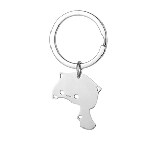 Polished stainless steel cartoon cat keychain with hollow design on white background