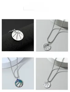 Detail view of hollow basketball pendant in silver and rainbow finish with box chain