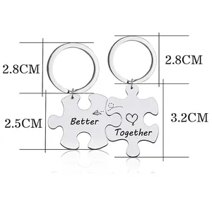 Polished stainless steel Better Together puzzle piece keychains for couples