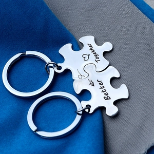 Stainless steel puzzle keychain set for couples with Better Together engraving and heart