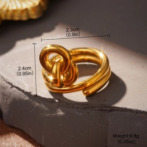 Detail view of interlocking golden double rings on stone with dimension 2.3cm x 2.4cm