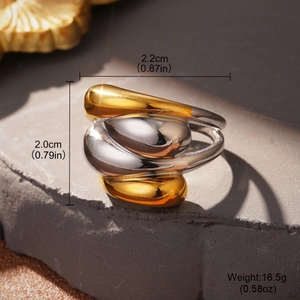 Detail view of two-tone knotted stainless steel ring with 2.2cm width and 2.0cm height