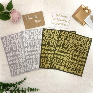 Detail of 1 inch gold and silver glitter alphabet stickers for DIY gift decoration